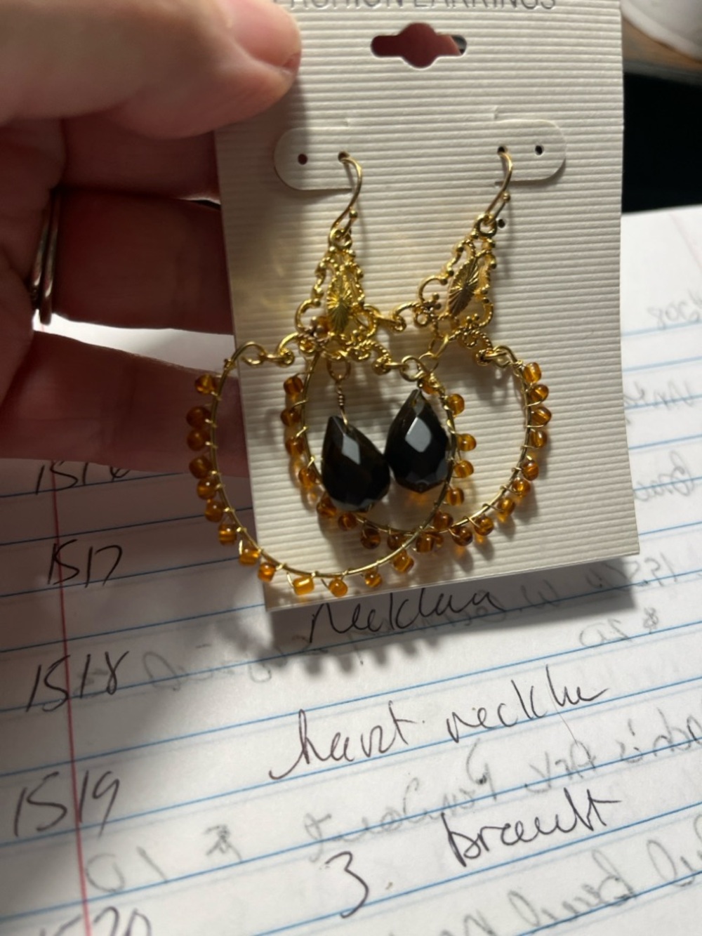 4 prs Gold-Tone Hoop Earrings with Amber Beads and Black Teardrop Stones.